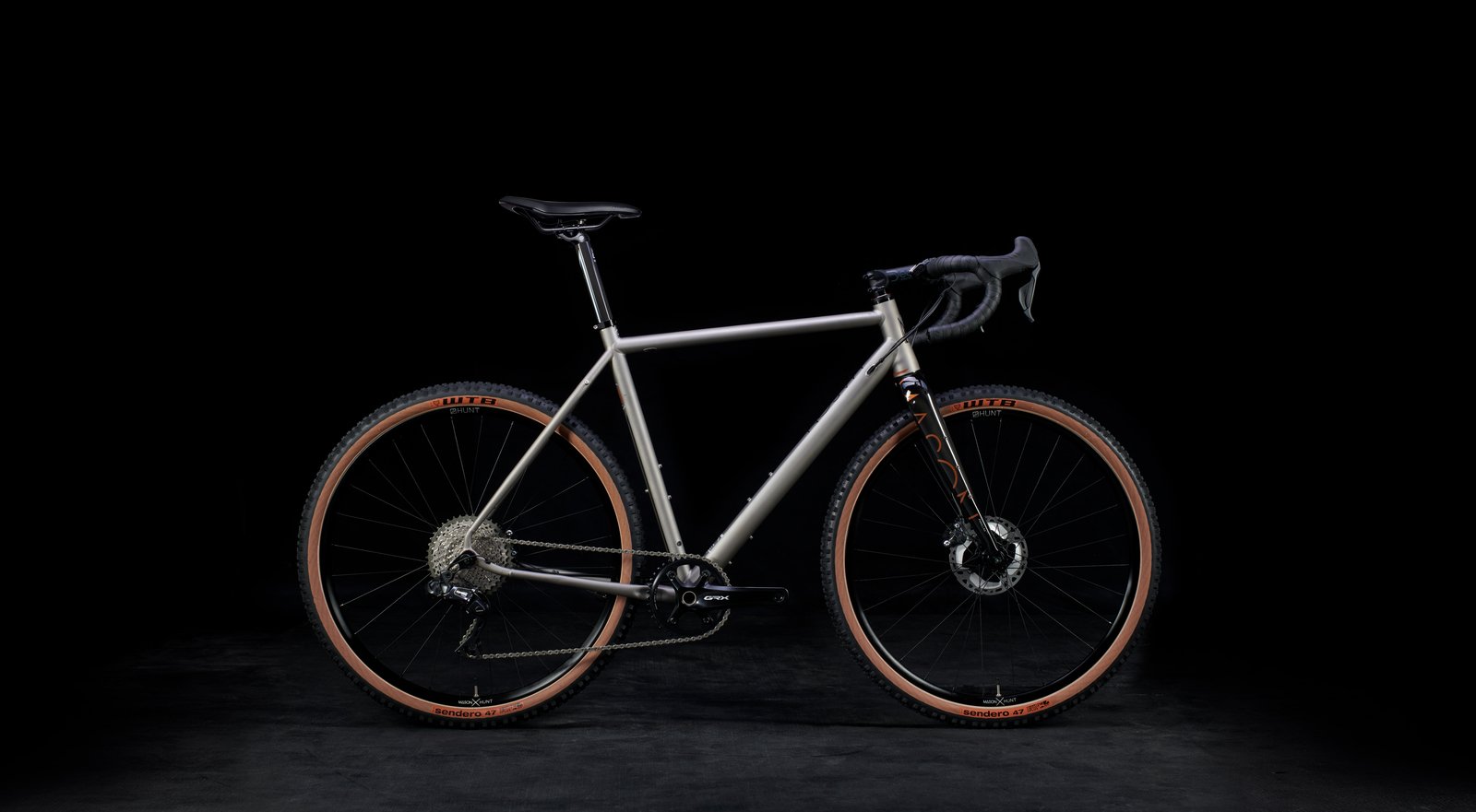 Mason Bokeh titanium gravel bike on a black background